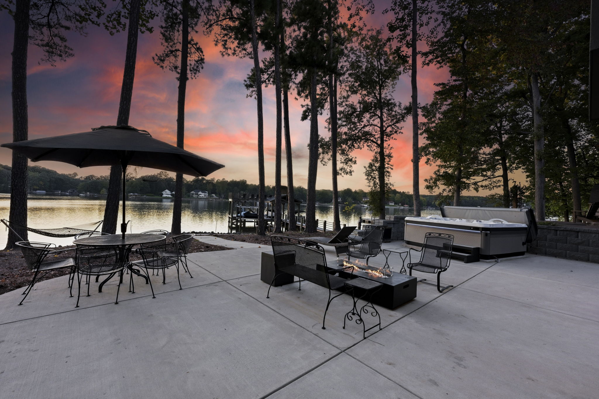 Back patio and hot tub at sunset